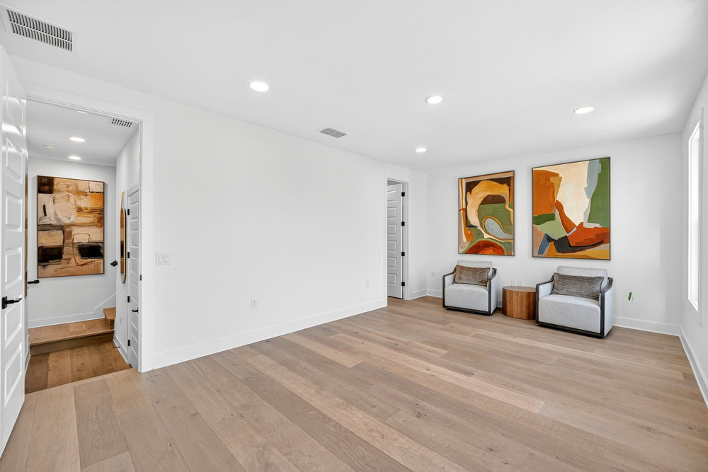 2707 Salek View Austin, TX 78741 - Photo 25 of 37 Unfurnished room featuring light wood-type flooring and recessed lighting