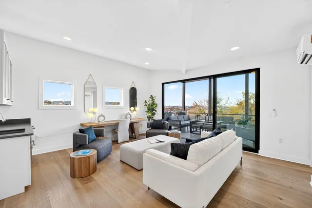 a living room with furniture and a couch