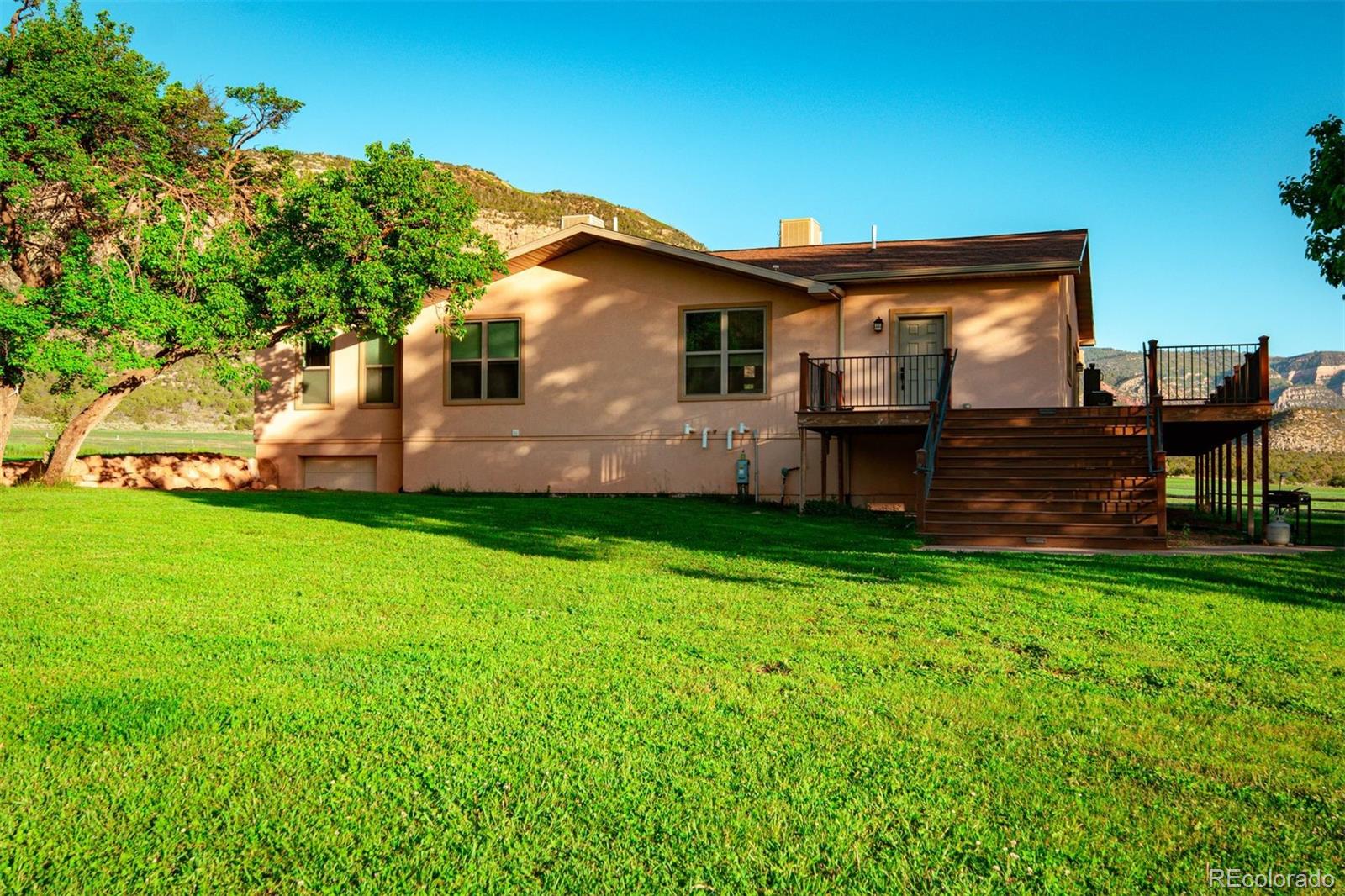 Undisclosed Address Paradox, CO 81429 - Photo 11 of 50 a front view of a house with garden