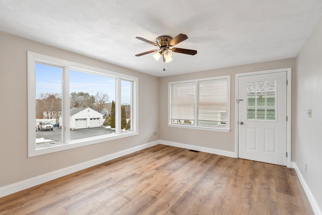 299 Asbury Street Hamilton, MA 01982 - Photo 22 of 37 a view of an empty room with a window