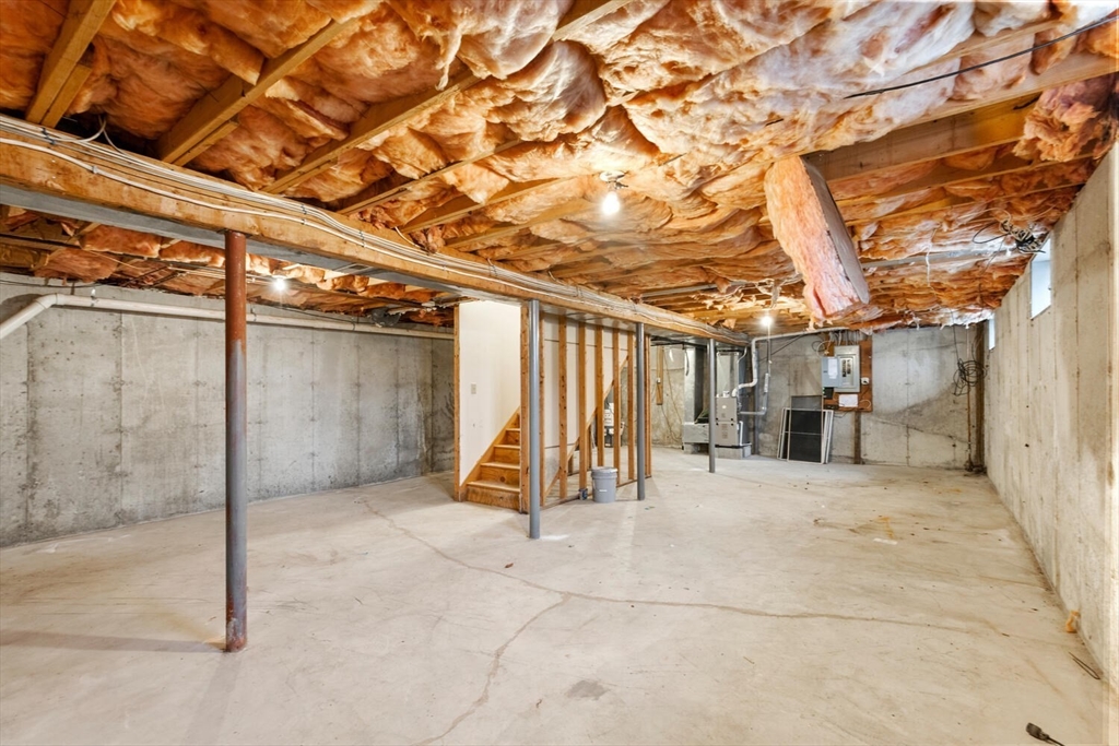 299 Asbury Street Hamilton, MA 01982 - Photo 30 of 37 a view of a room with wooden walls