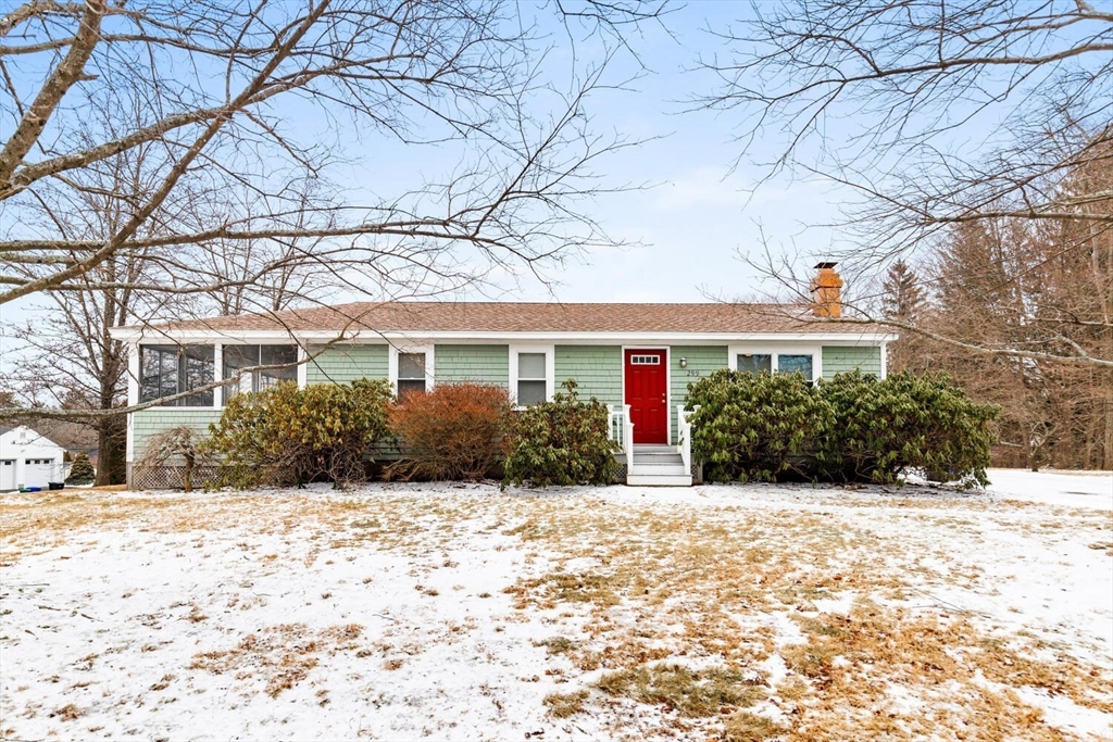 299 Asbury Street Hamilton, MA 01982 - Photo 34 of 37 a front view of house with yard and trees around