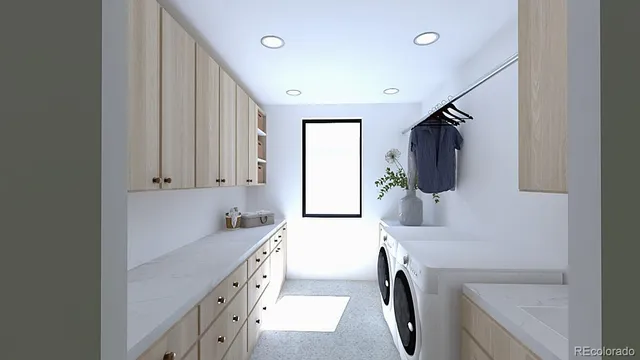 a kitchen with a sink cabinets and a window