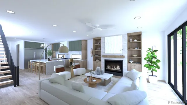 a living room with furniture fireplace and potted plants