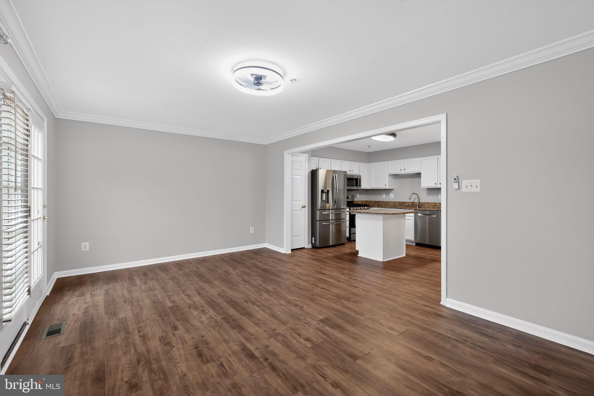 18707 Little Star Lane Germantown, MD 20874 - Photo 11 of 30 a view of a kitchen with a sink dishwasher refrigerator and a stove top oven