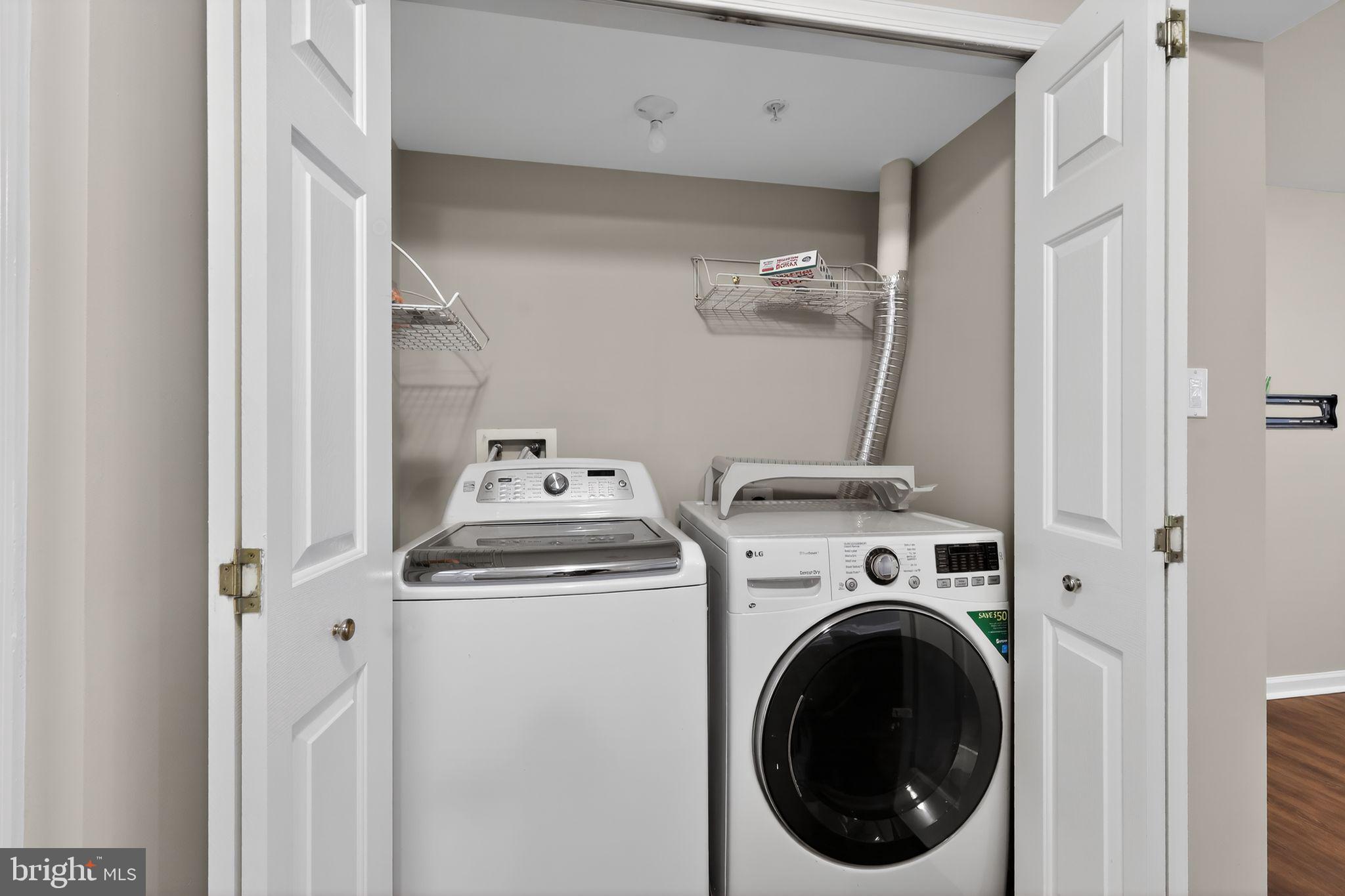 18707 Little Star Lane Germantown, MD 20874 - Photo 27 of 30 a utility room with dryer and washer
