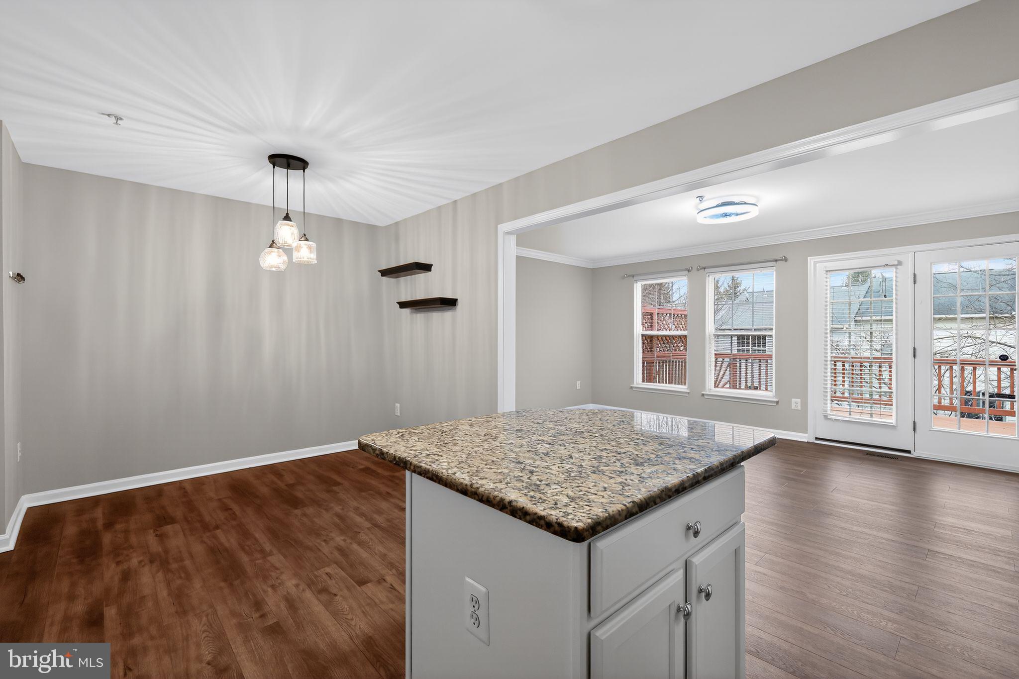18707 Little Star Lane Germantown, MD 20874 - Photo 7 of 30 wooden floor in an empty room with a window