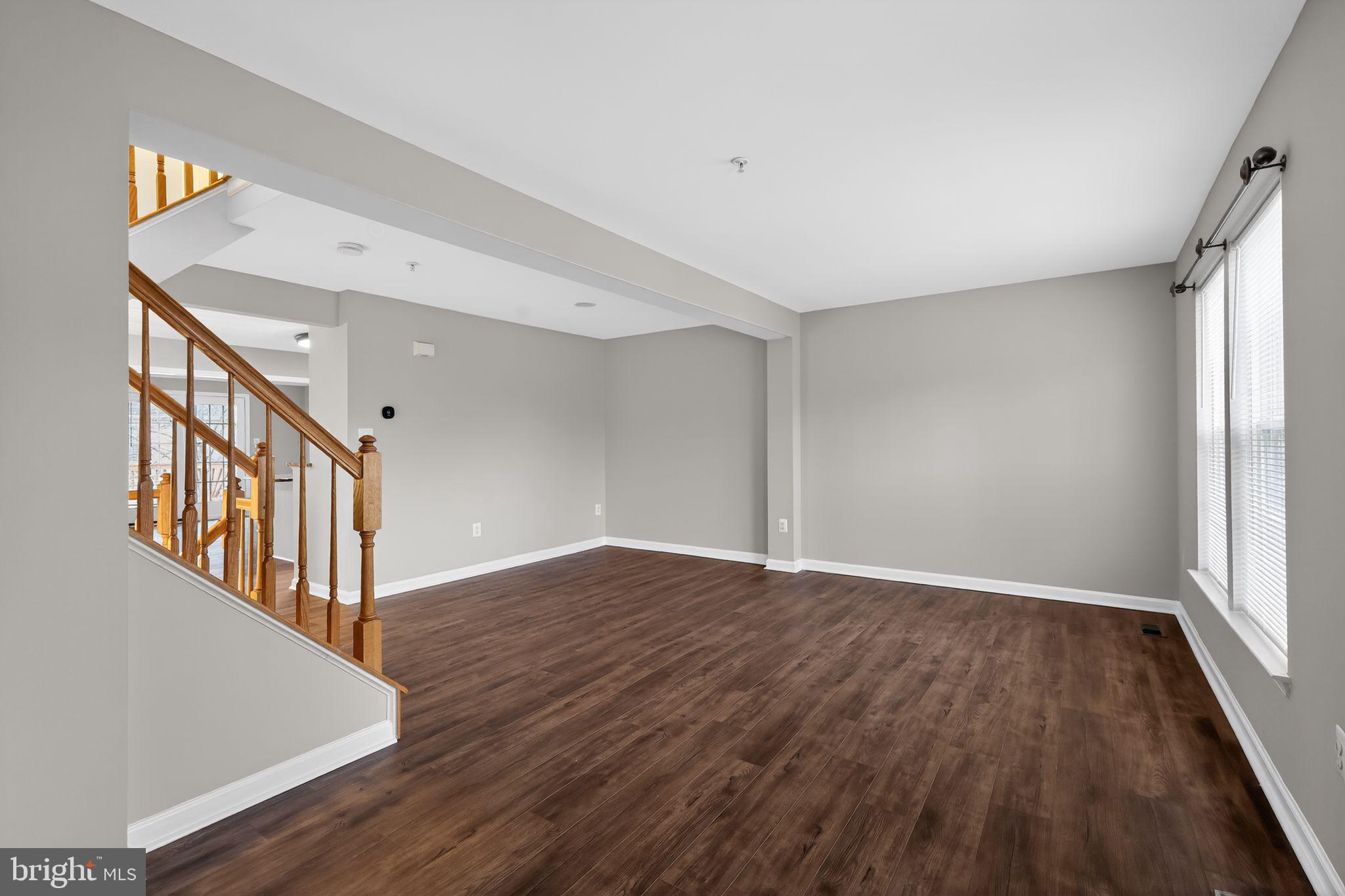 18707 Little Star Lane Germantown, MD 20874 - Photo 9 of 30 a view of an entryway with wooden floor