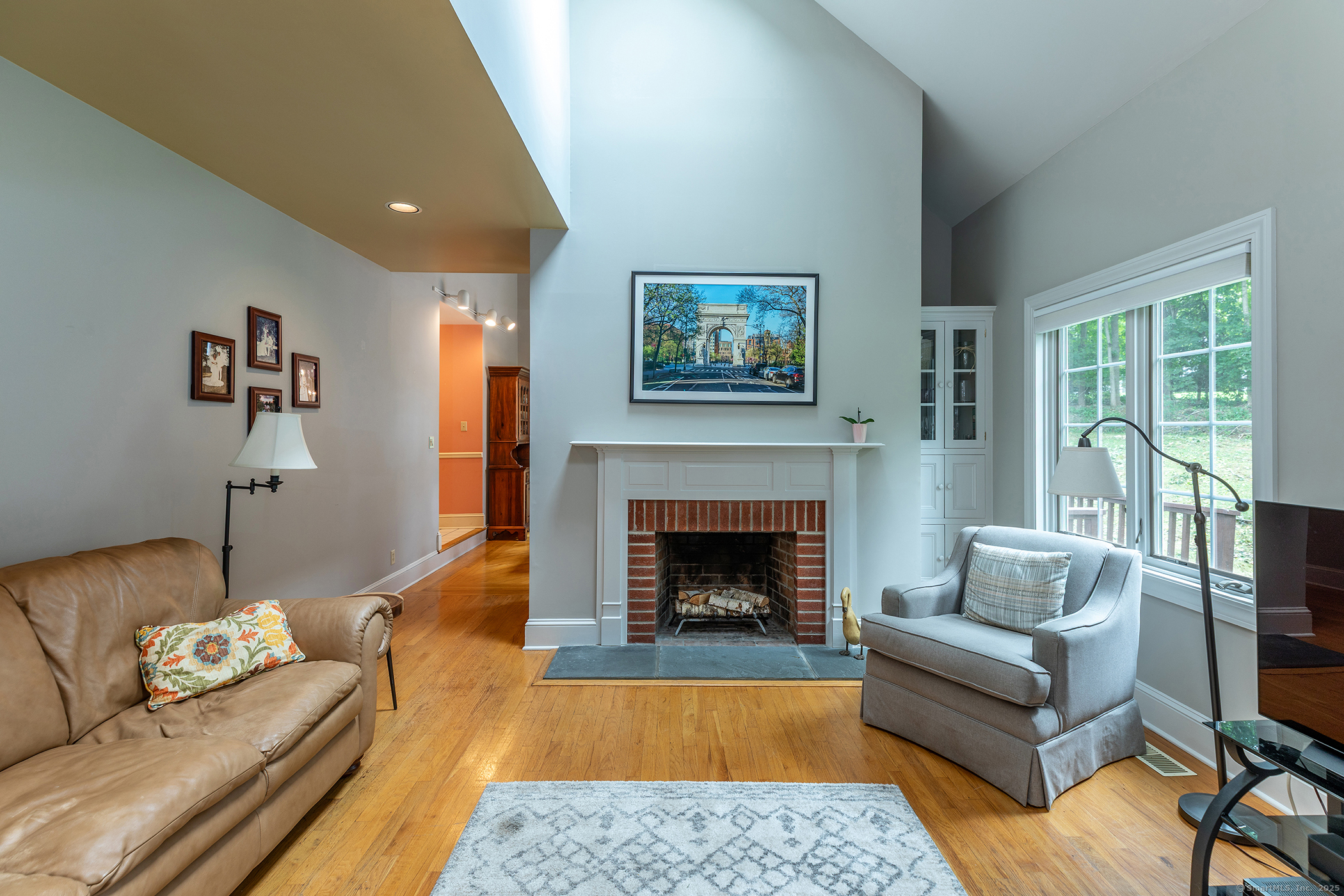 29 Quarry Ridge Road, Unit 29 Washington, CT 06777 - Photo 8 of 19 a living room with furniture and a fireplace