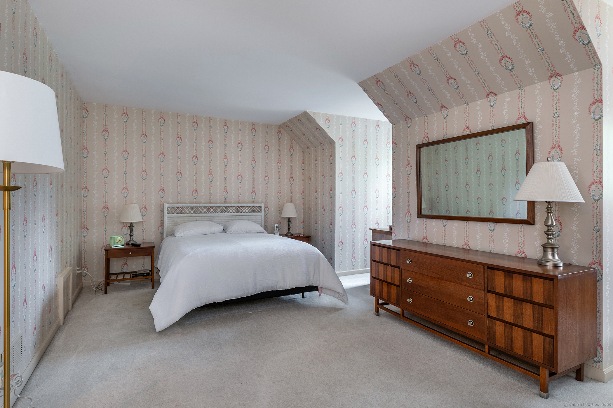 29 Quarry Ridge Road, Unit 29 Washington, CT 06777 - Photo 10 of 19 a bedroom with a bed and a night stand