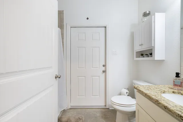 a kitchen with a stove and a sink