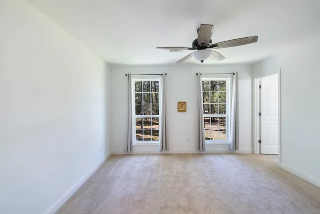a view of a storage & utility room with a sink
