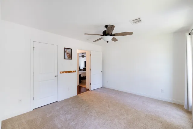 a en suite bathroom with a sink and mirror
