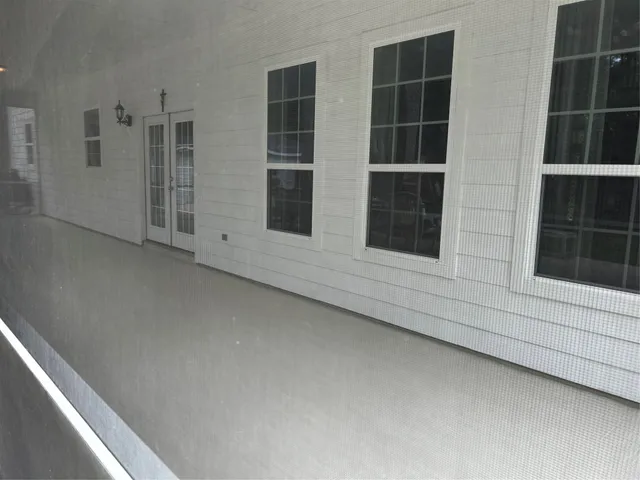 a bed room with furniture and a window