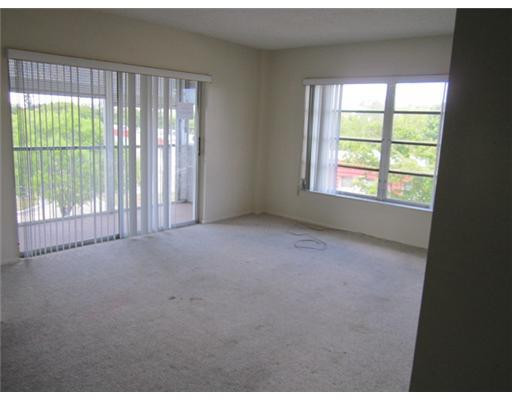 4176 Inverrary Drive, Unit 411 Lauderhill, FL 33319 - Photo 2 of 9 Living Room