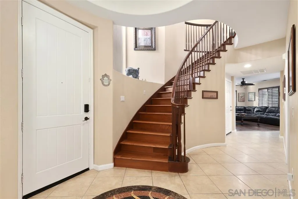 8403 Watson Ranch Road San Diego, CA 92129 - Photo 11 of 25 a view of entryway and hall with wooden floor