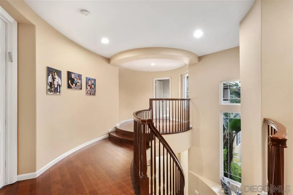 8403 Watson Ranch Road San Diego, CA 92129 - Photo 12 of 25 a view of entryway and hall with wooden floor