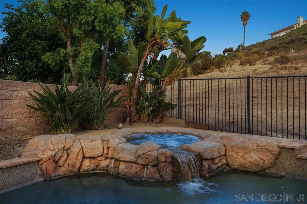 8403 Watson Ranch Road San Diego, CA 92129 - Photo 21 of 25 a view of backyard with swimming pool and furniture