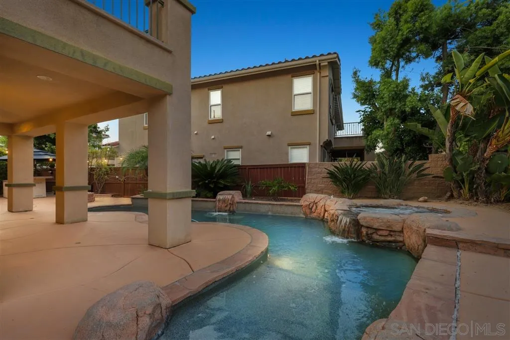 8403 Watson Ranch Road San Diego, CA 92129 - Photo 22 of 25 a view of a house with patio