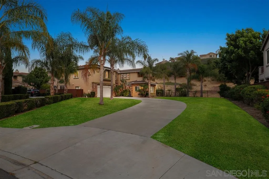8403 Watson Ranch Road San Diego, CA 92129 - Photo 25 of 25 a view of a house with a yard