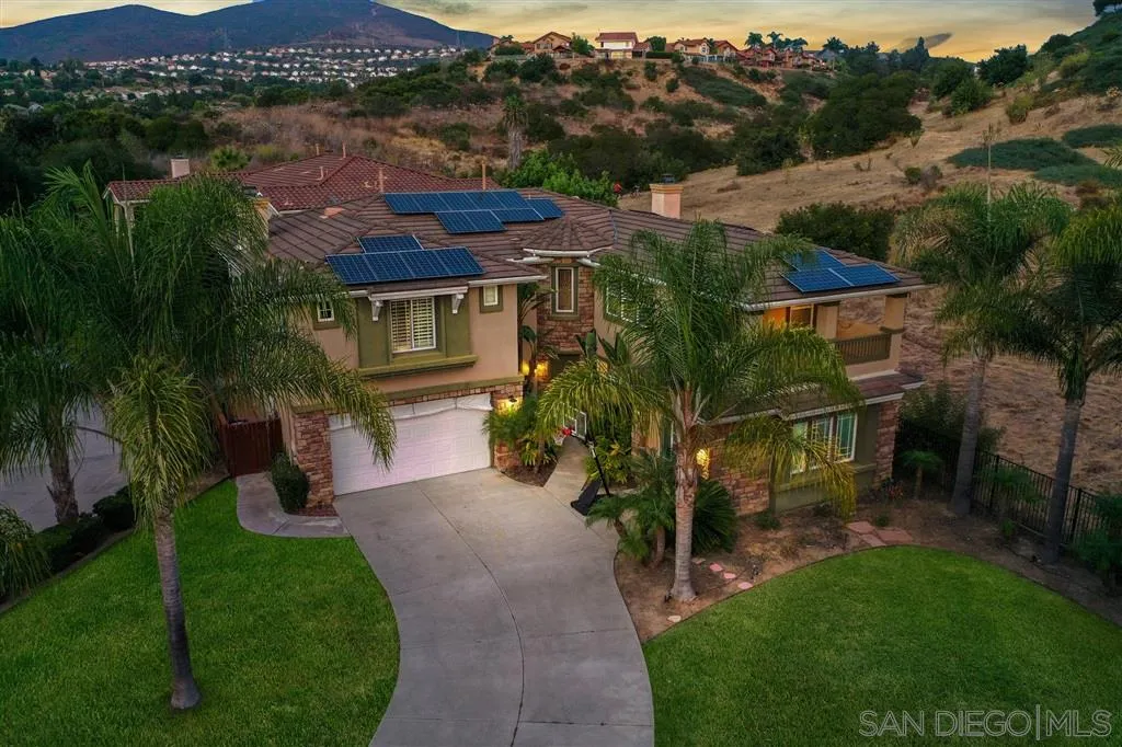 8403 Watson Ranch Road San Diego, CA 92129 - Photo 3 of 25 a view of house with garden space and mountain view