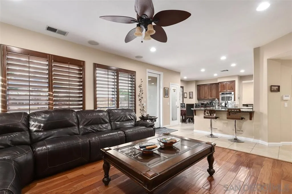 8403 Watson Ranch Road San Diego, CA 92129 - Photo 6 of 25 a living room with furniture and a large window