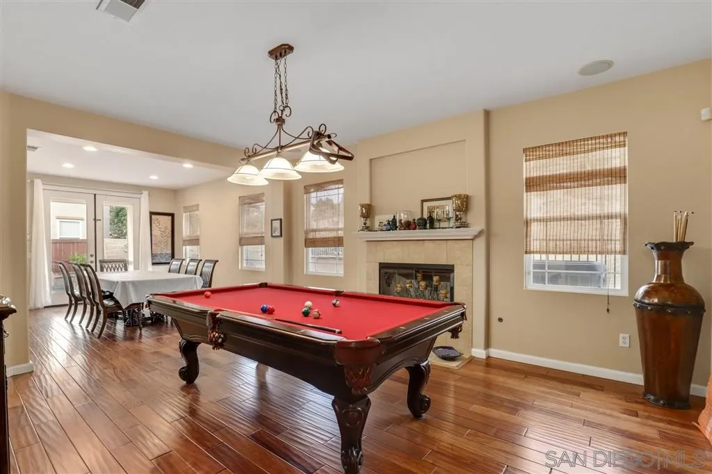 8403 Watson Ranch Road San Diego, CA 92129 - Photo 10 of 25 a room with pool table and windows
