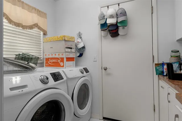 a swimming pool with outdoor seating and yard