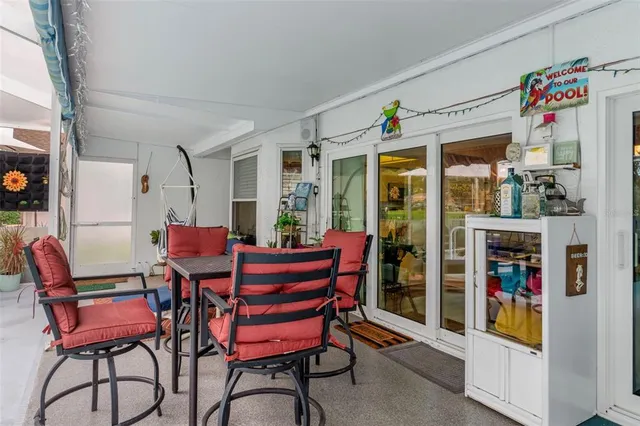 a view of a lake with houses in the background