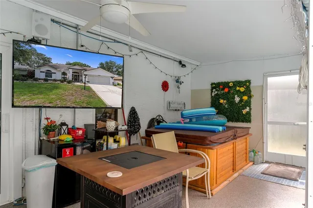 a view of pool and outdoor space