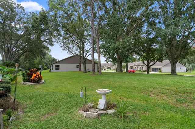 a view of a dinning table and chairs in the patio