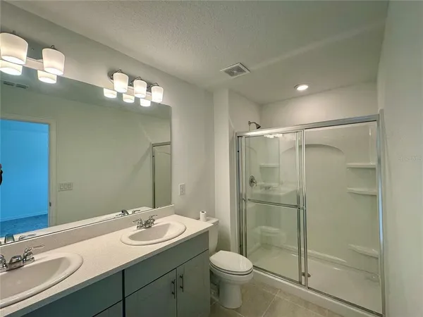 an empty room with closet area