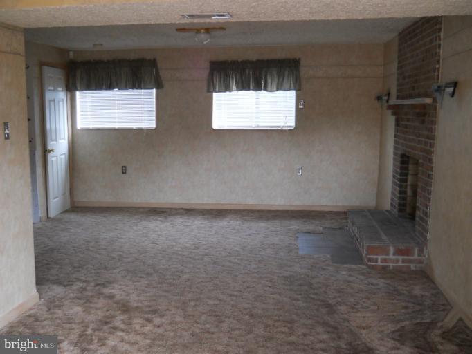 4016 Cedar Mills Road Randallstown, MD 21133 - Photo 20 of 27 Basement-front of basement-photo one