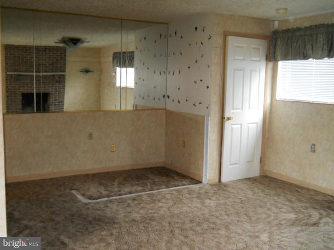 4016 Cedar Mills Road Randallstown, MD 21133 - Photo 21 of 27 Basement-front of basement-photo two
