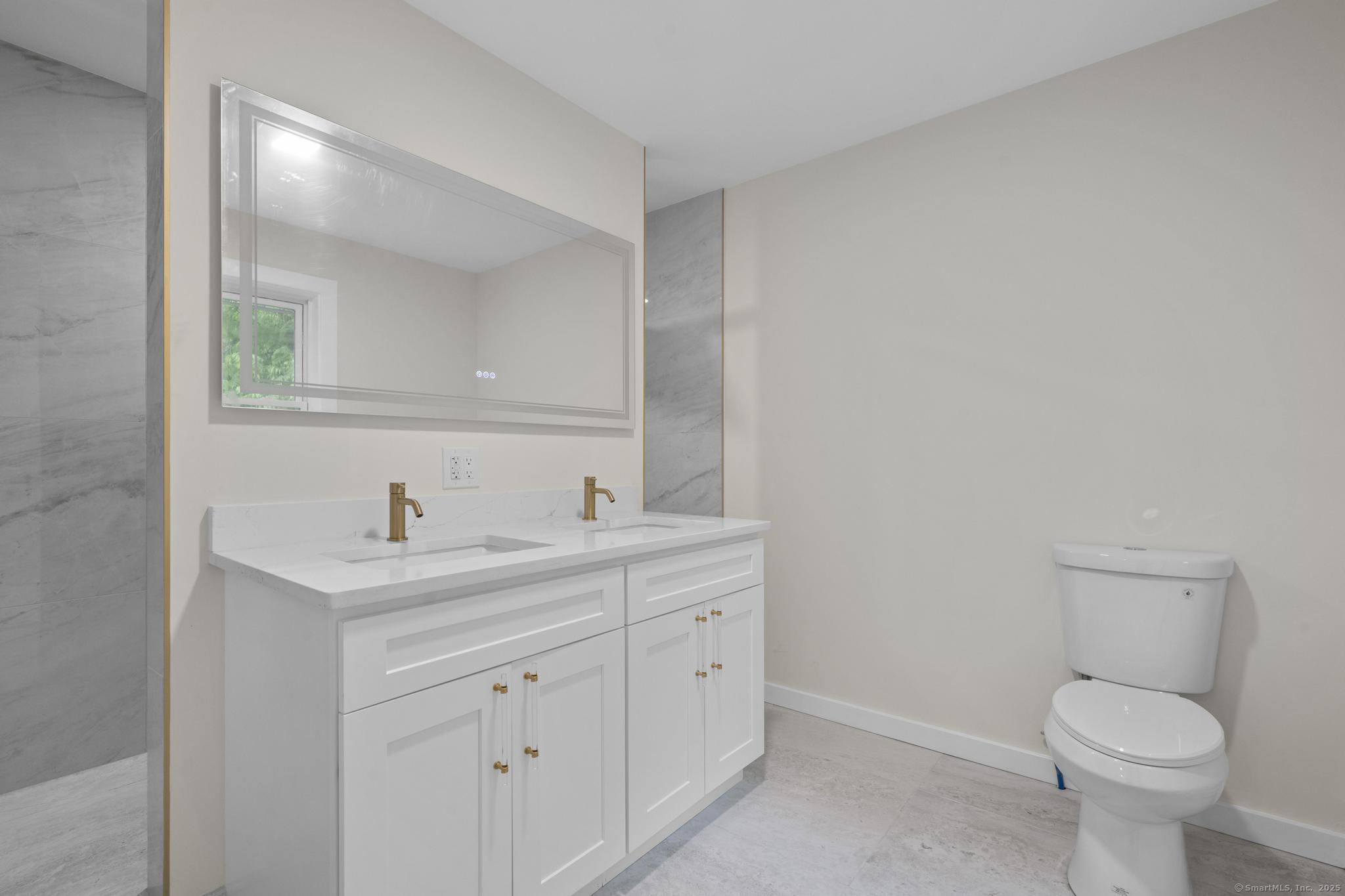 123 Lower Road North Canaan, CT 06024 - Photo 12 of 38 a bathroom with a toilet sink and mirror