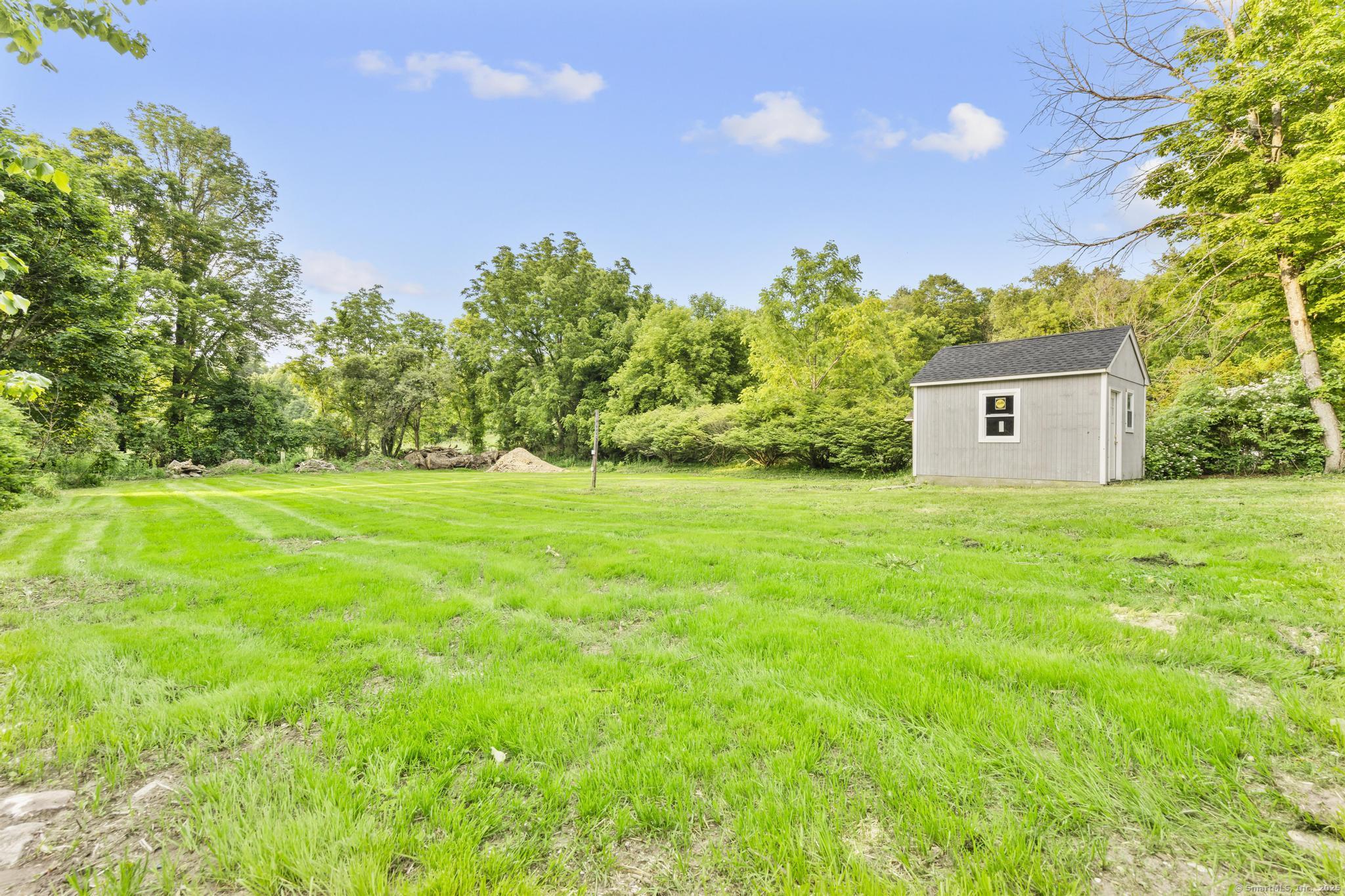 123 Lower Road North Canaan, CT 06024 - Photo 2 of 38 a front view of a house with garden