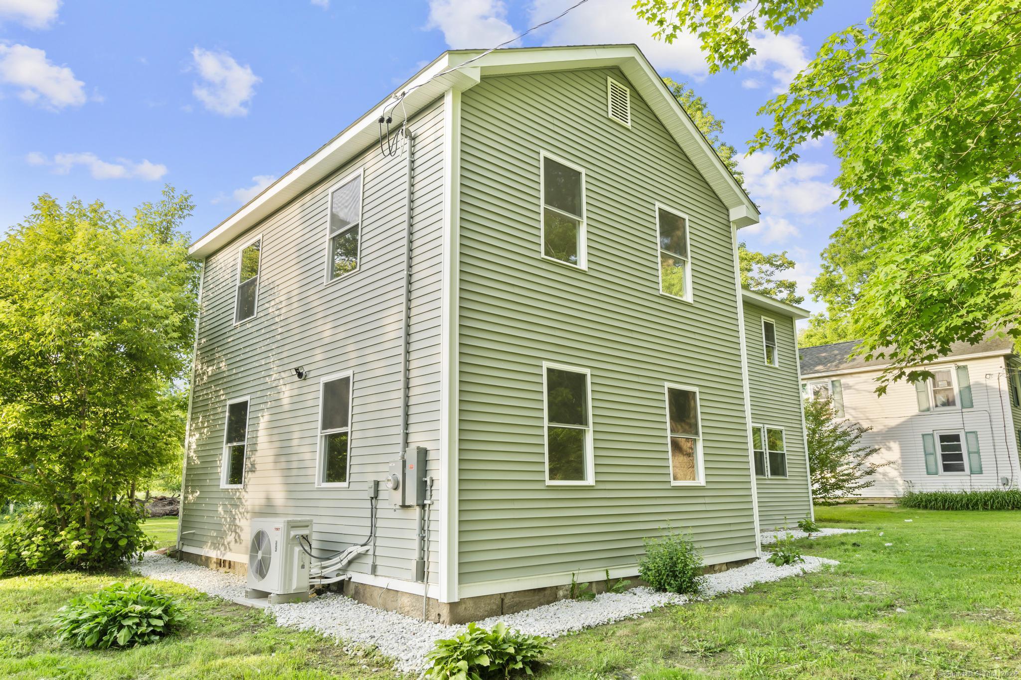 123 Lower Road North Canaan, CT 06024 - Photo 32 of 38 a front view of a house with a yard