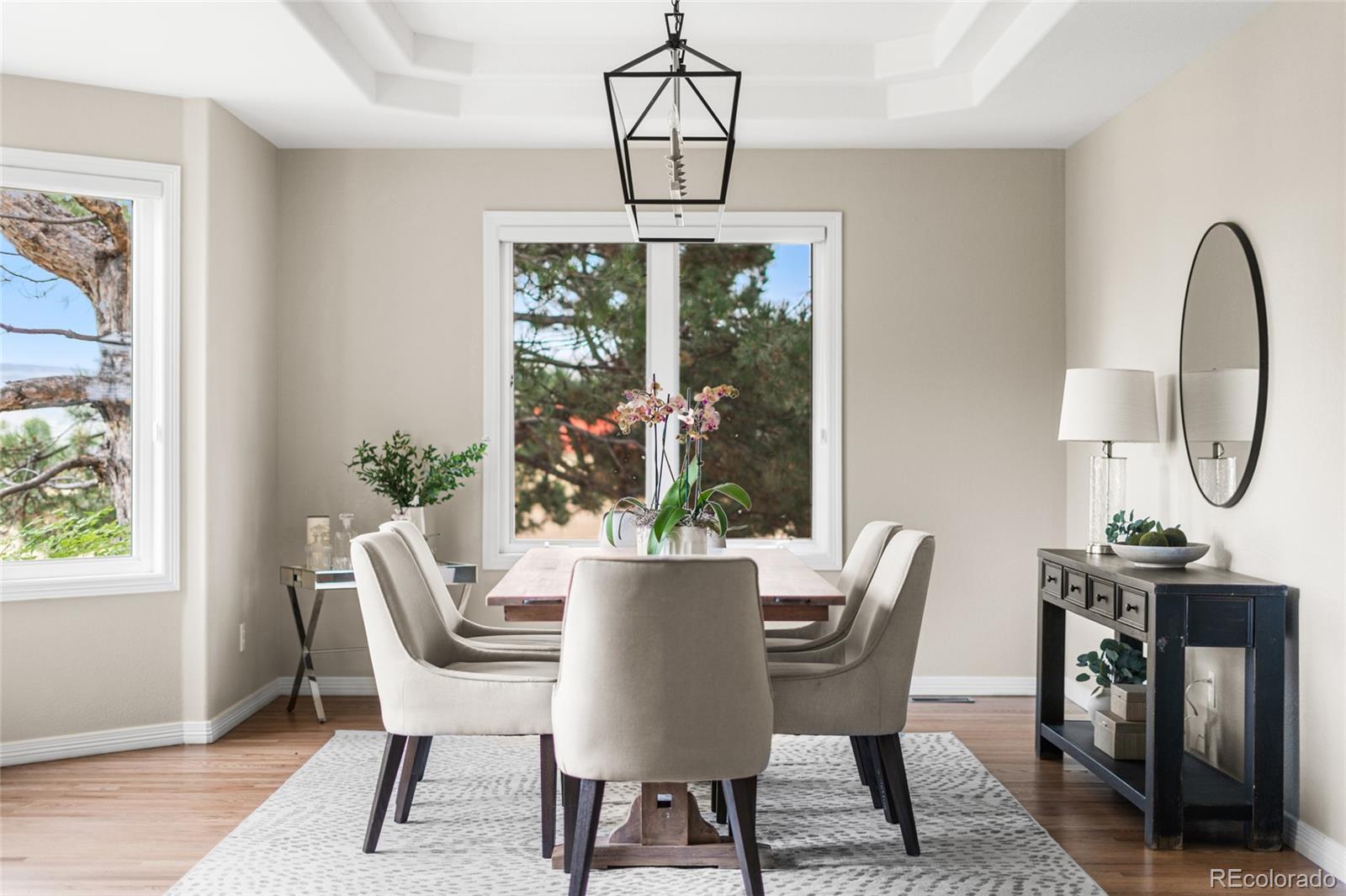 11041 Puma Run Lone Tree, CO 80124 - Photo 13 of 35 a view of a dining room with furniture window and outside view