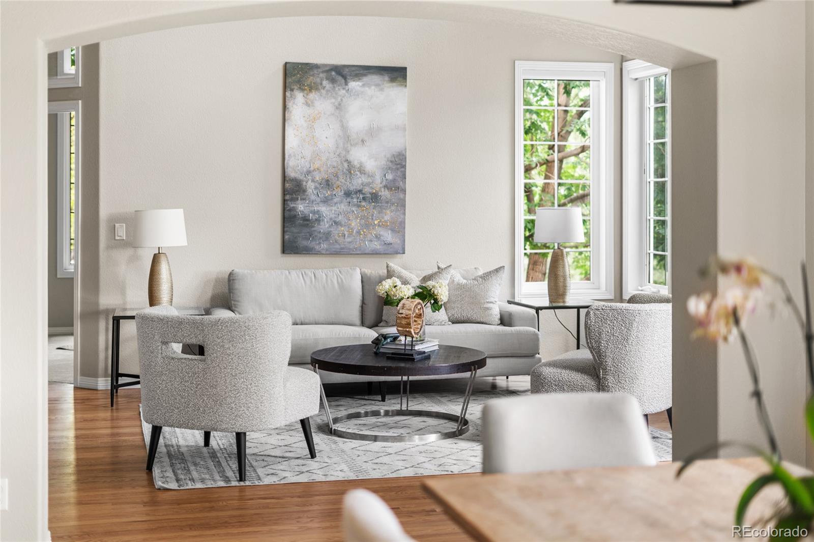 11041 Puma Run Lone Tree, CO 80124 - Photo 15 of 35 a living room with furniture and a large window