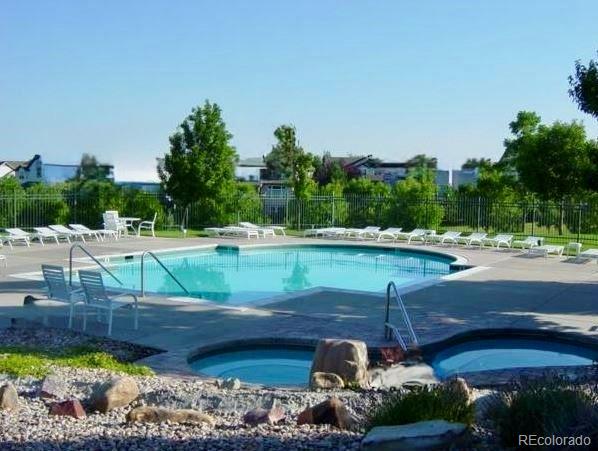 11041 Puma Run Lone Tree, CO 80124 - Photo 32 of 35 a view of a lake view