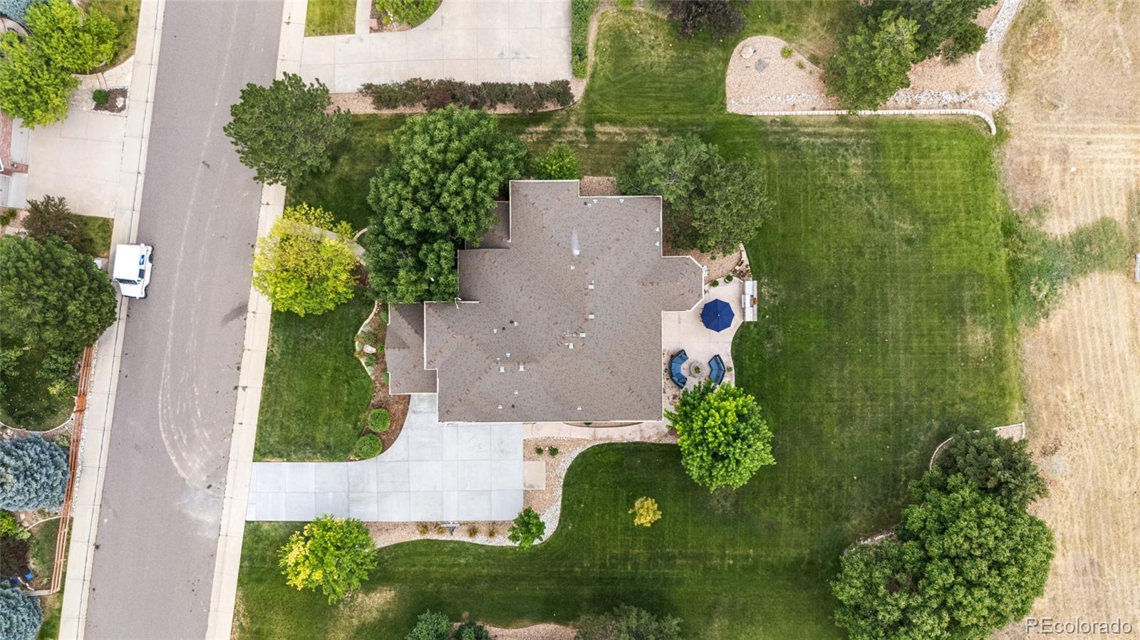 11041 Puma Run Lone Tree, CO 80124 - Photo 33 of 35 an aerial view of residential house with outdoor space and street view
