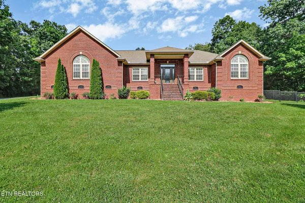 a front of a house with yard