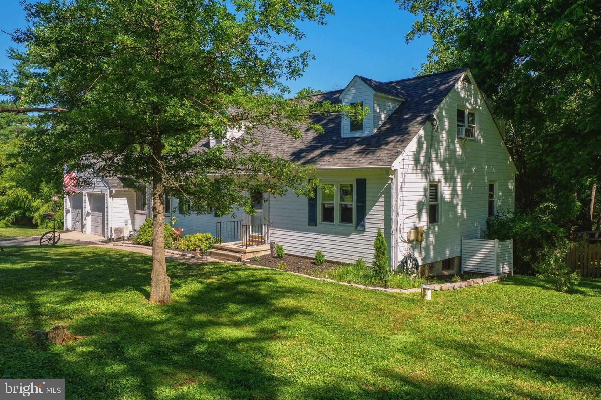 1102 Greenway Road Cockeysville, MD 21030 - Photo 44 of 47 Charming home nestled in lush greenery.
