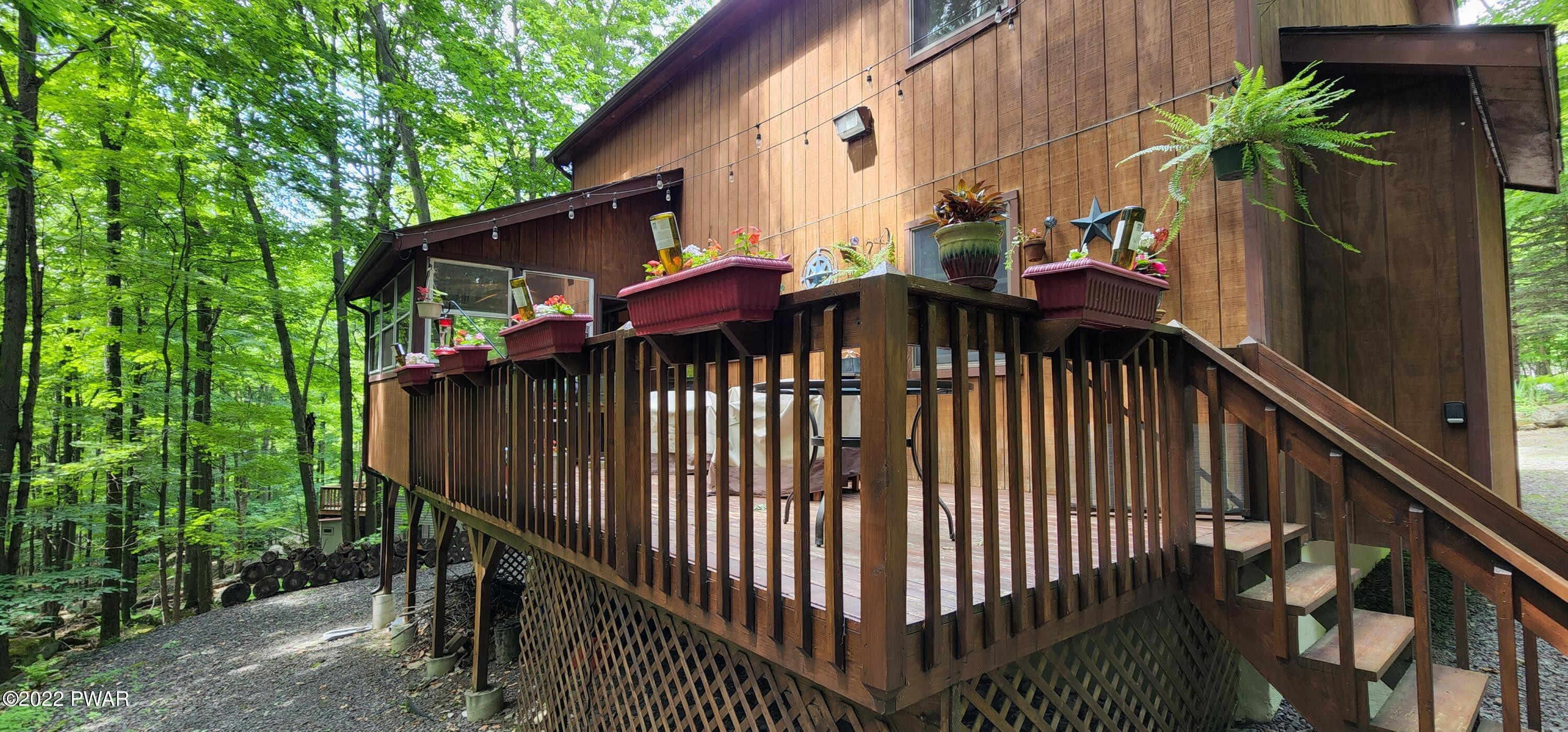 40 Boulder Road Lake Ariel, PA 18436 - Photo 49 of 52 a view of a wooden house with a deck