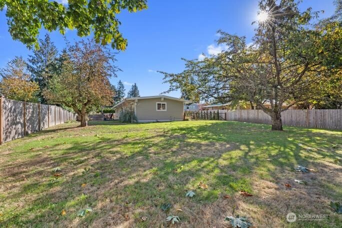 21904 88th Place West Edmonds, WA 98026 - Photo 36 of 40 a view of a backyard with a garden