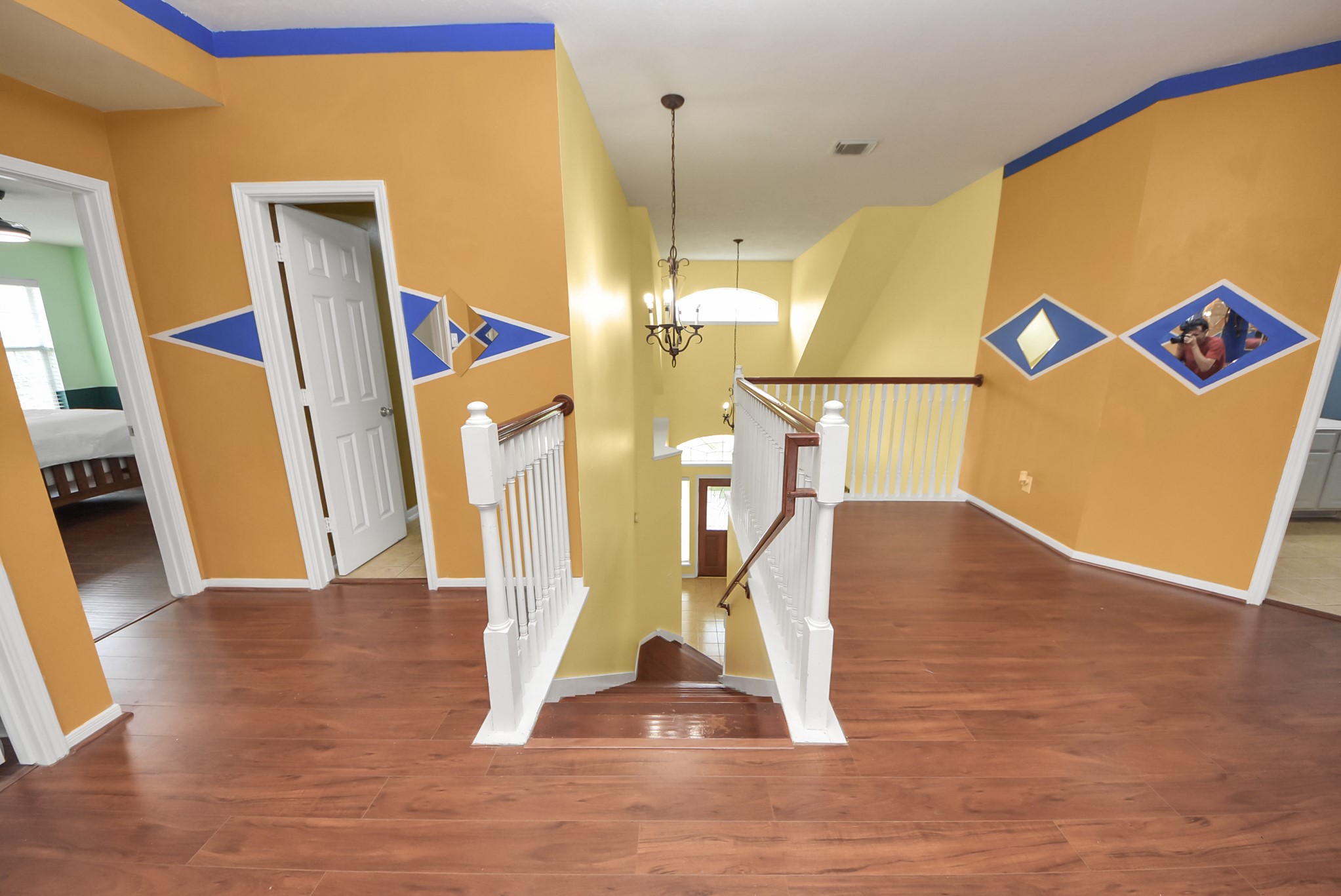 14103 Imperial Wood Lane Rosharon, TX 77583 - Photo 22 of 36 Spacious upstairs landing with open railing detail