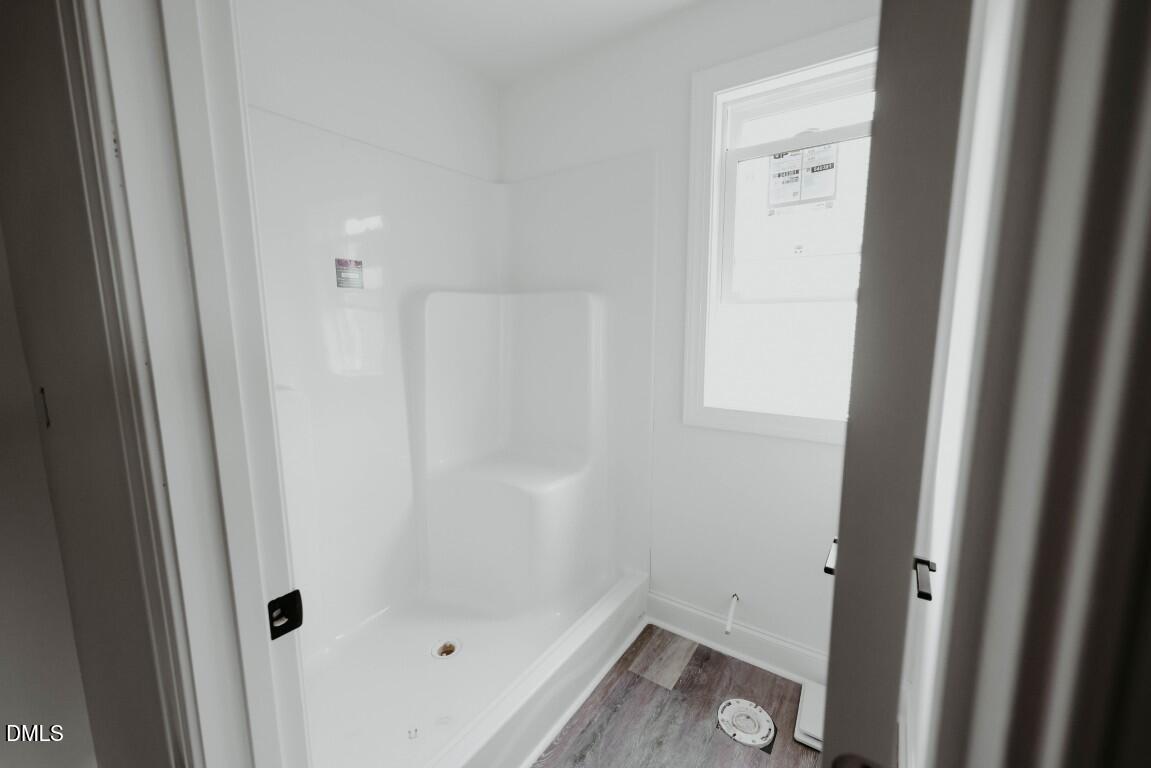 309 East Perry Avenue Wake Forest, NC 27587 - Photo 13 of 24 a bathroom with a sink