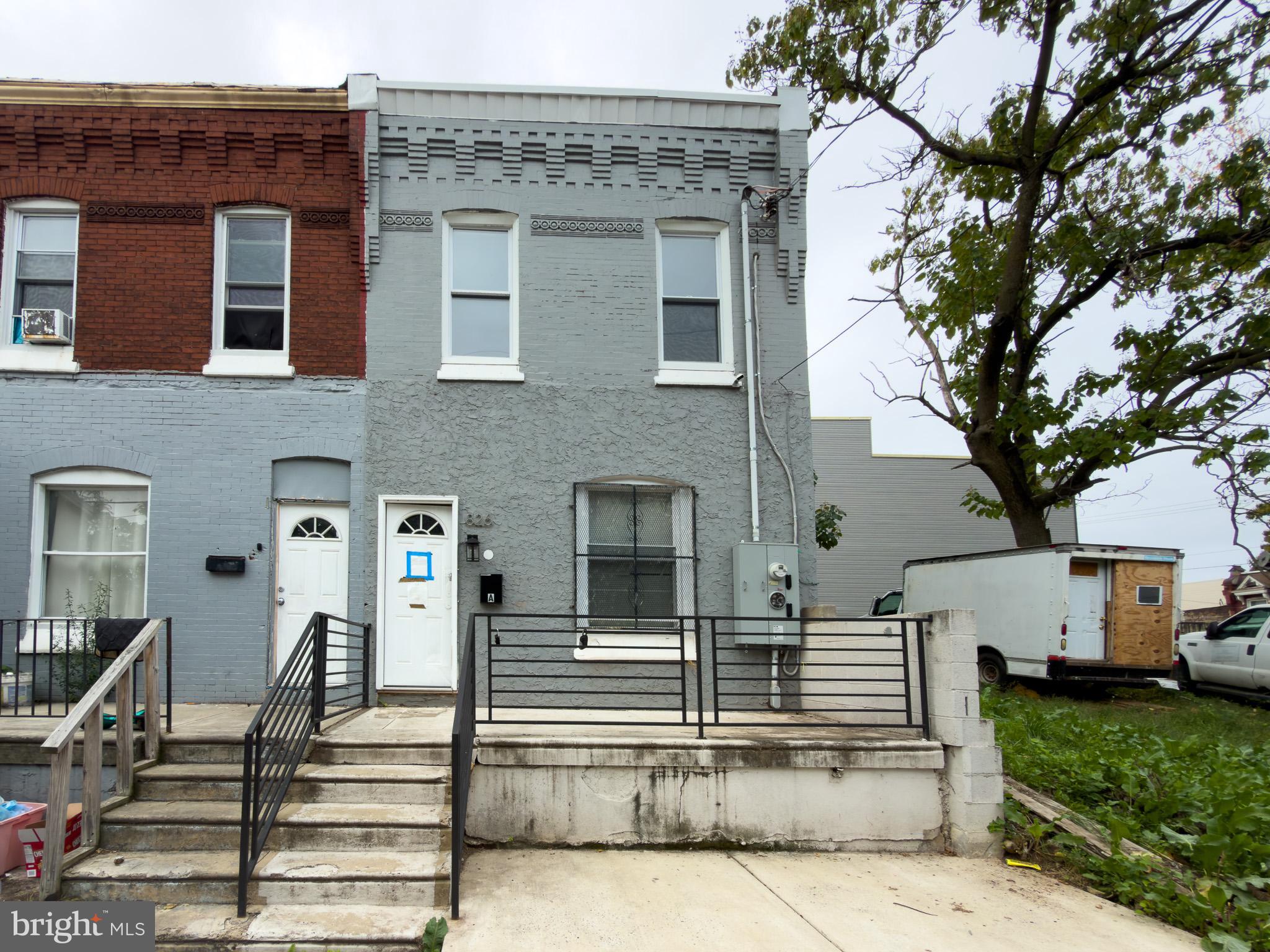 826 Union Street Philadelphia, PA 19104 - Photo 1 of 16 a view of a house with more windows and a tree