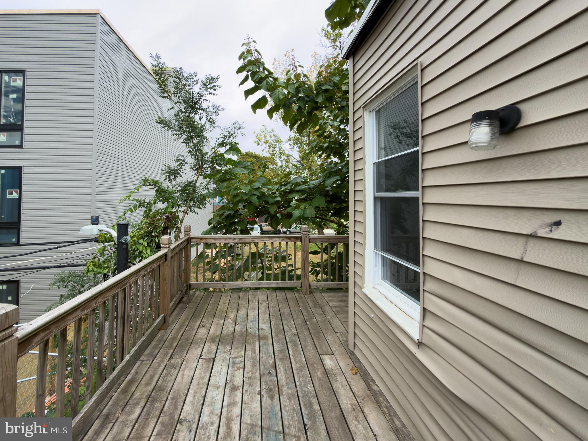 826 Union Street Philadelphia, PA 19104 - Photo 13 of 16 a view of balcony with wooden floor and potted plant