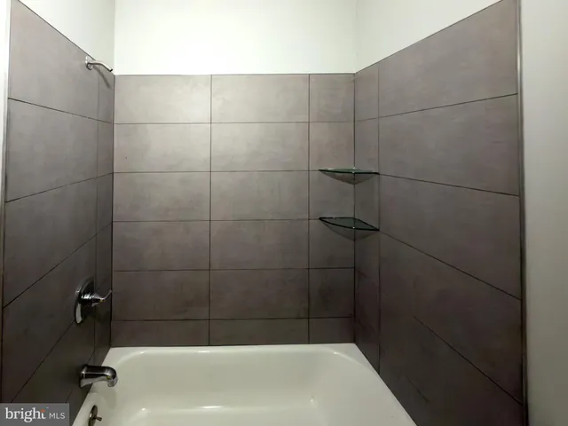 a bathroom with a bathtub